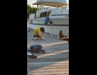 Collab IITW - Woman brown romper lie down boat dock
