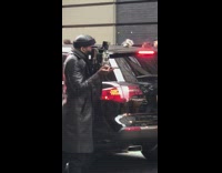 Two girls middle of street cupcake