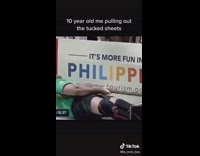 Guy struggles to untuck sheets at hotel