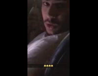 Girl touches white shirt guy with foot 