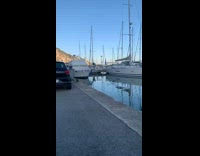 Guy standing next to water loses balance and falls in