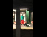 man elf costume filming himself person sitting on floor