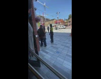 Grandpa tries to open locked store door 