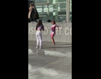 Woman pink dress dance skatepark Barcelona Museum