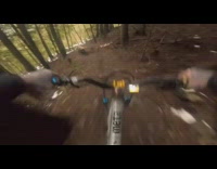 Collab SendItOfficiall - Guy and friend ride bicycles down mountain