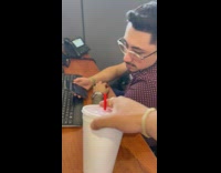 Man Blocks Friends Lips with his Finger