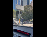 Man in suit selfie video at street