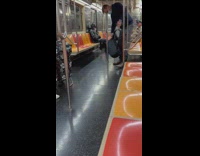 Guy sit wear batman costume inside the train in new york 
