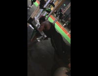 Guy does pushup on rope and ball 