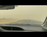 Man driving on road almost 0 visibility