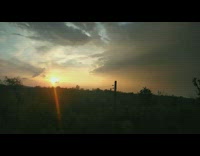 Time lapse clouds move across sky sunrise 