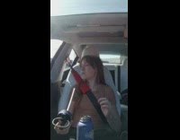 Girl with a long ice formed in the straw