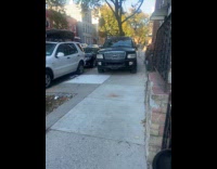 Collab WINY - Black truck drive on the street sidewalk