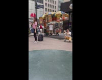Woman pink top glasses look up pictorial from behind