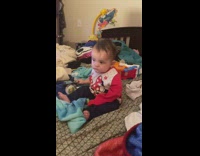 Baby girl tries to stay awake cries