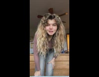 Girl shows grandmas two new cats