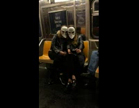 Collab Subway Creatures - Two women alien mask take selfie train