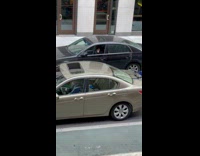 Collab WINY - Man in black parked car windows down sings loudly