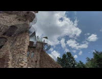 Guy sit on bishop castle direct drone dragon