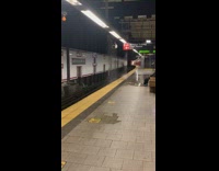 Water leaks onto tracks subway train station 