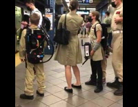 Family of five dressed like ghostbusters 