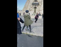 man one hand up jump people statues