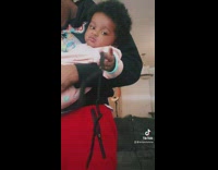 Baby lets go of hair when girl says she fights babies