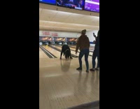 girl bowling under legs video