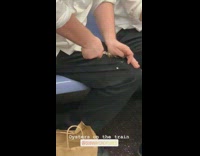 Man shucks and opens oysters on the subway train then eats them