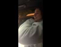 Guy farts inside car grey jacket girl