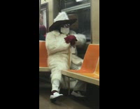 Guy white fur jacket cane red gloves 