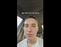 Guy in car filter red pink lips makeup eyes 