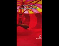 Two guys t posing in middle of waterslide 