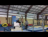 Girl spins flips on gymnastics bar fail