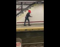 Pennywise clown mask dances subway black jacket