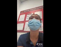 Woman reacts to coworker laughing out of force 