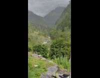 Double rainbow on hill with guitar music