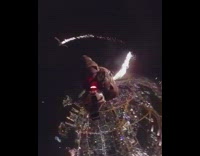 Guy jumps out airplane wingsuit firework skydive