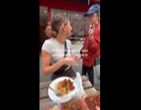 Strange elderly woman tries to kiss woman in Paris