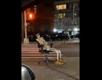 Skeleton wears face mask and brown boots 