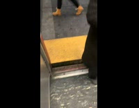 Guy wearing bear helmet playing guitar piano