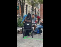 Black dress girl blue bird on shoulder