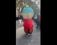 Eric Cartman inflatable costume walk on street