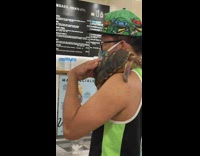 TMNT fan orders food with pet turtle on shoulder 
