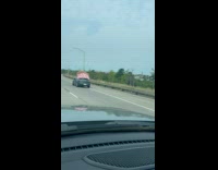 Flower panel tied on top of car 