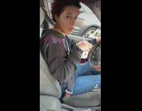 Girl pretends to grab thigh while driving