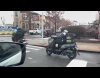 Motorcycle scooter attached on another motorcycle scooter