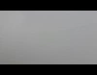 Video of clouds on top of mountain