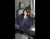 Guy sings while getting kidnapped 