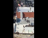 Woman Dances on Rooftop for Video 